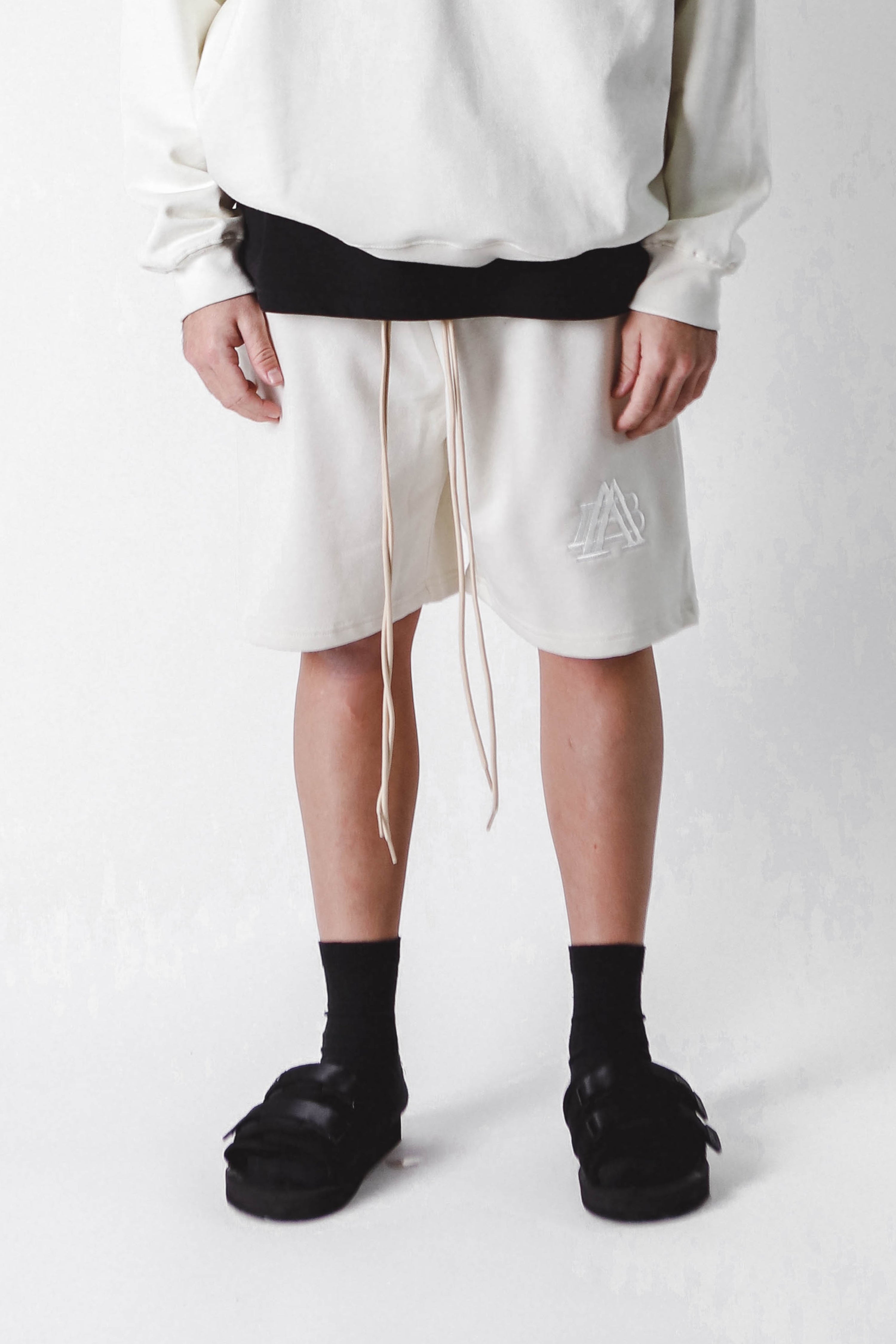 "A-TEMPORAL" BONE WHITE SHORTS