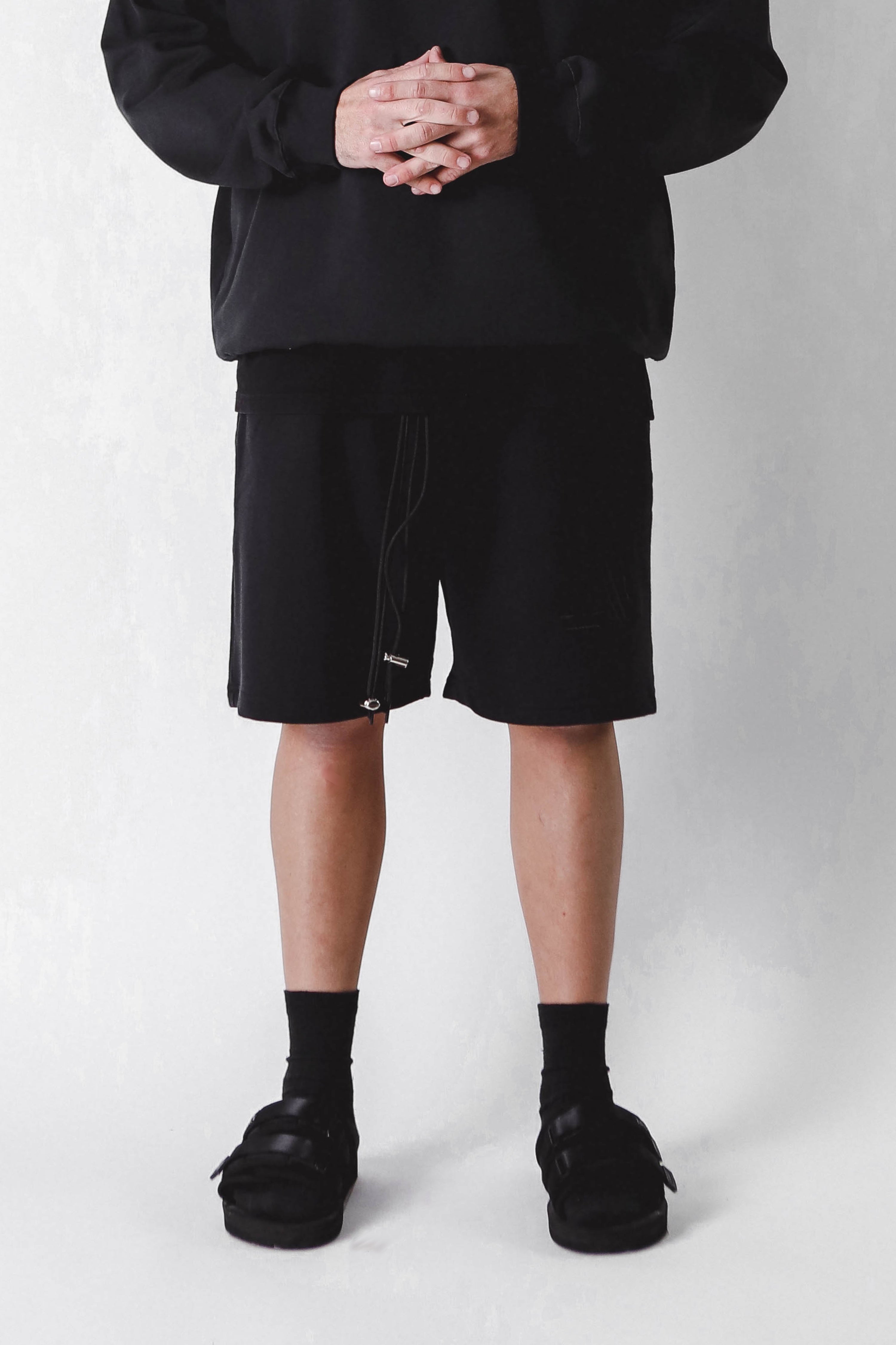 "A-TEMPORAL" BLACK SHORTS