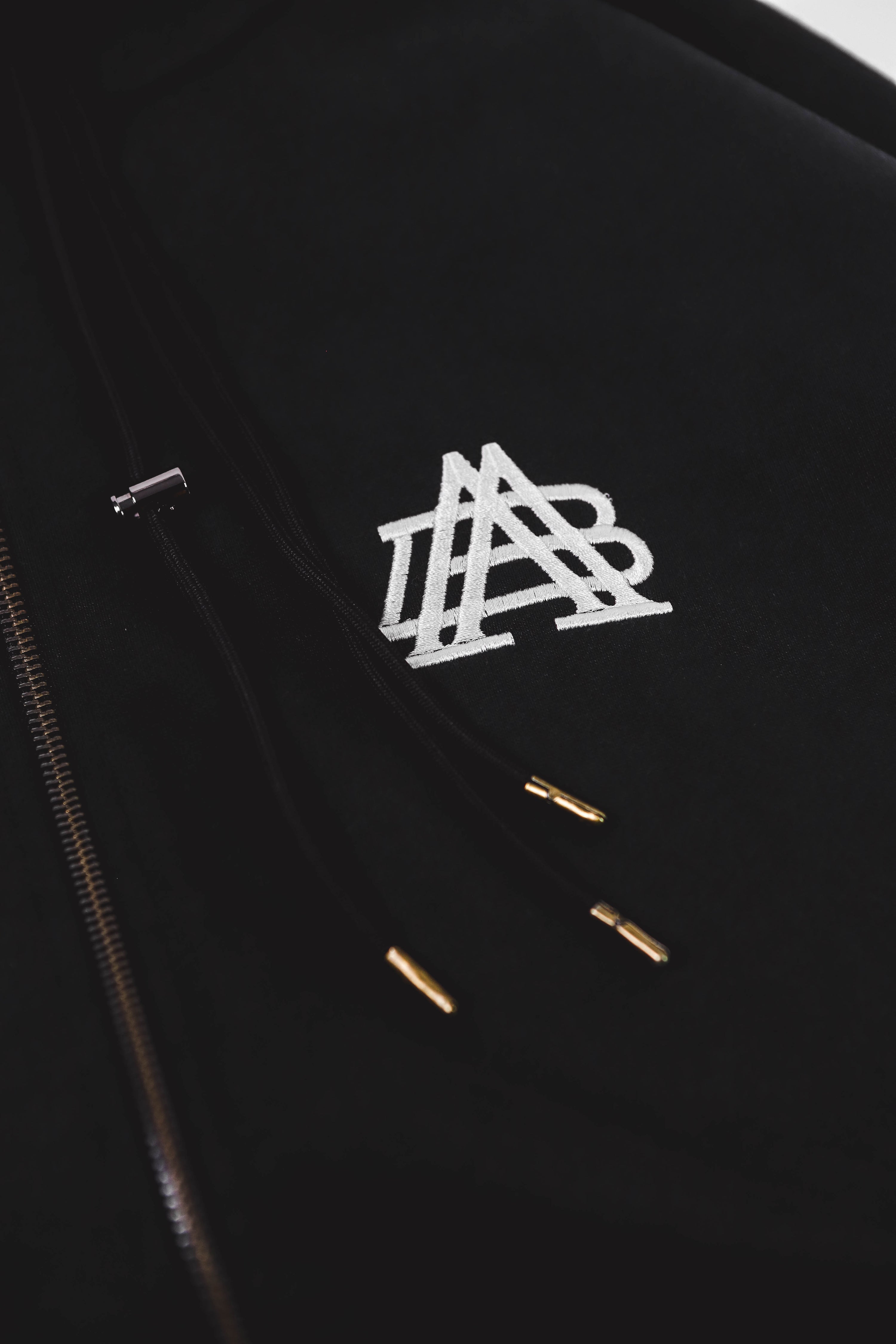 "A-TEMPORAL" BLACK ZIPPER HOODIE