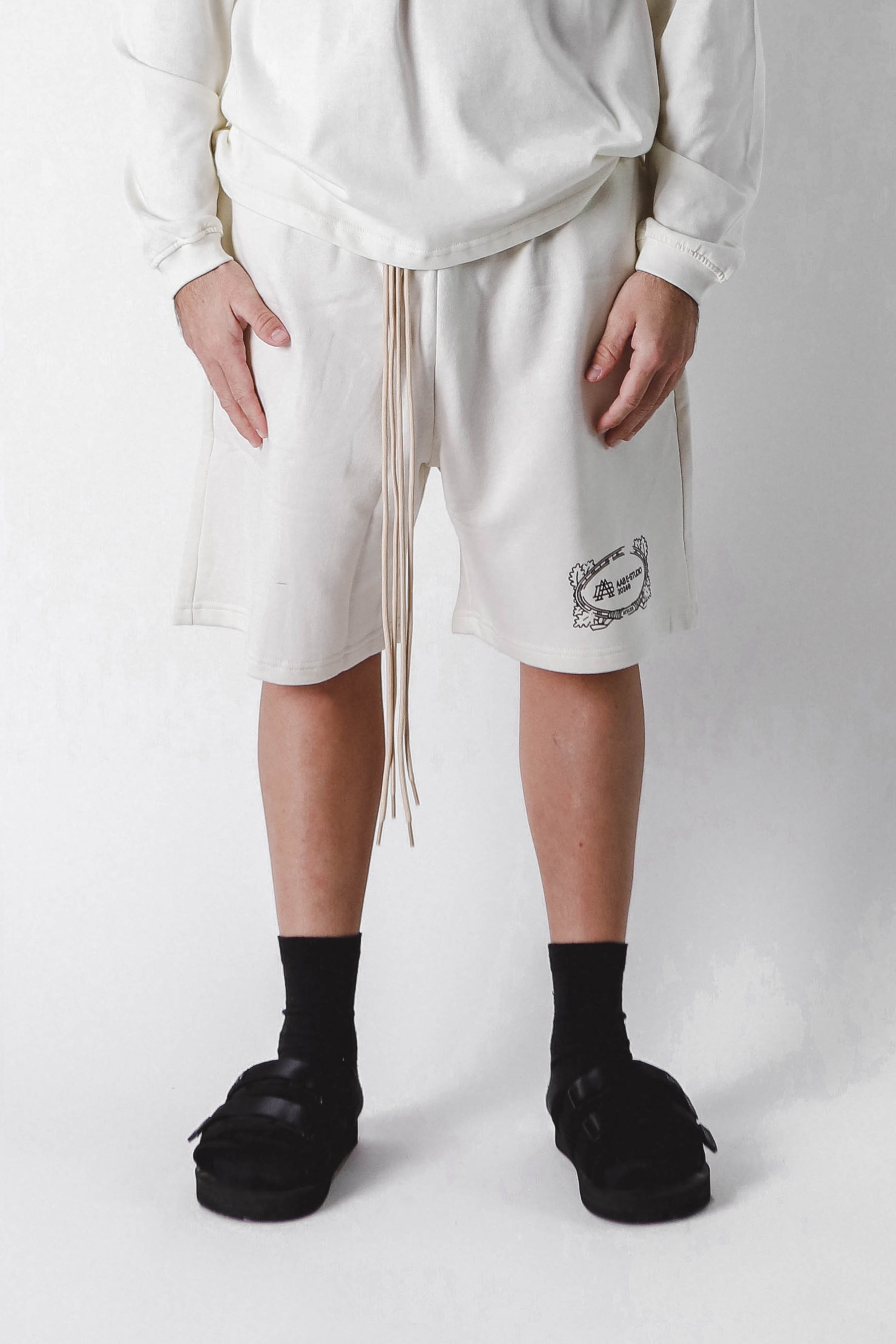 "A-TEMPORAL" BAROQUE BONE LOGO SHORTS